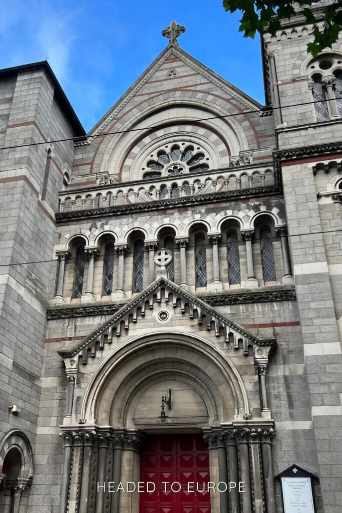 The detailed Romanesque-Gothic façade of St. Ann’s Church with its red doors and carved stonework stands out as one of the most Instagrammable places in Dublin for architecture enthusiasts.